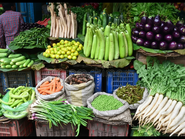 Display of various vegetables at a market stall