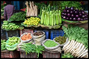 Display of various vegetables at a market stall