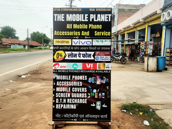 Advertisement board for 'The Mobile Planet' with various mobile phone brands and services.