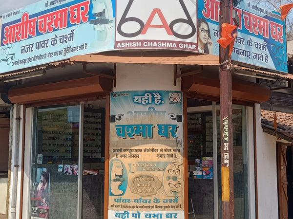  storefront with multiple signs and advertisements on a building facade