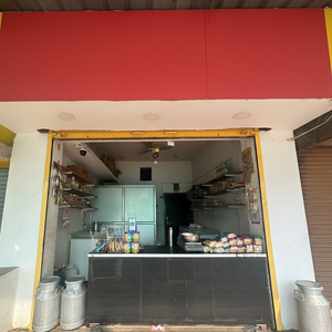 Narmada Dairy Shop Exterior (Enhanced Square)