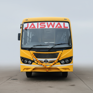 Jaiswal Tour and Travels yellow Tata bus front view with marigold garland – square optimized