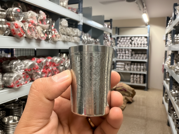 Engraved steel glass – Ganesh Mahesh Utensil Corner, Pendra